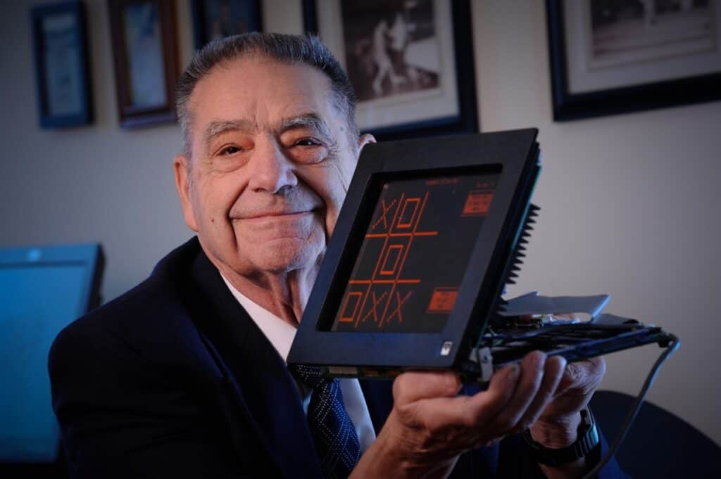 Donald Bitzer with the flat-panel display.