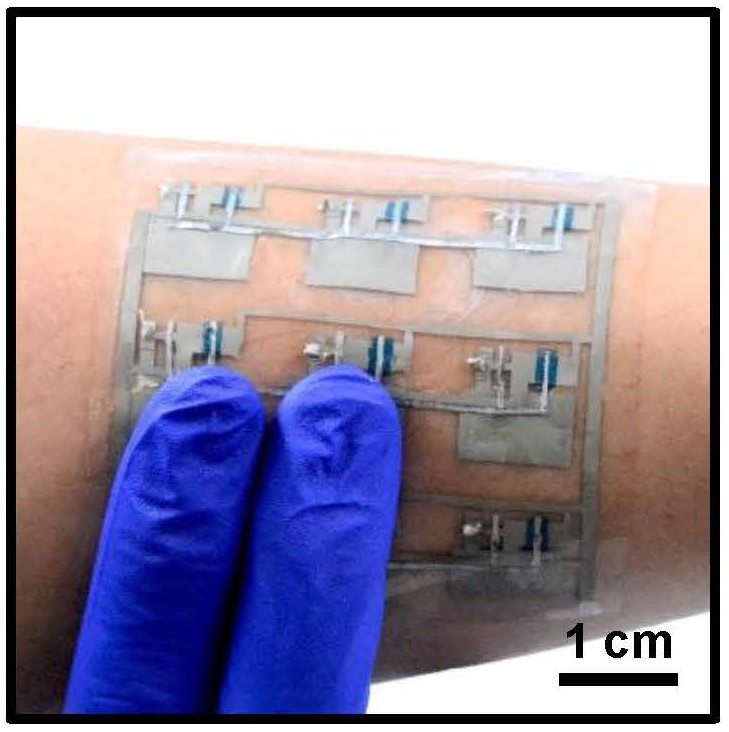 Depiction of stretchable skin adhered to a person's arm