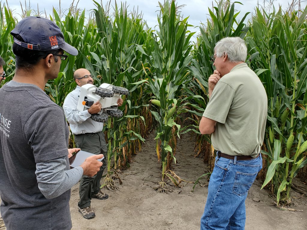 Chowdhary with a TerraSentia robot (photo credit: The New York Times)