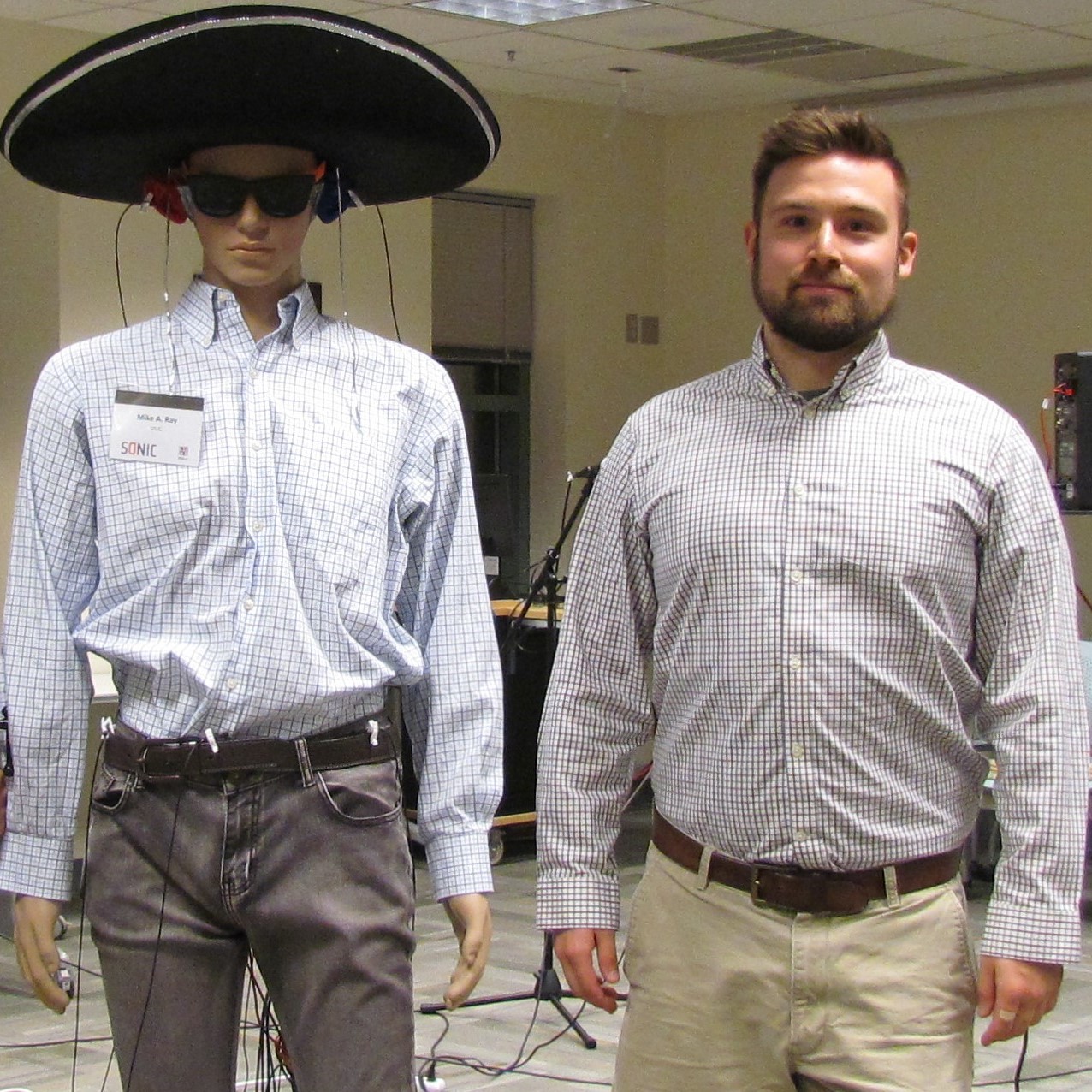 Corey with the mannequin the lab uses to demonstrate microphone usage all over a person's bdy.