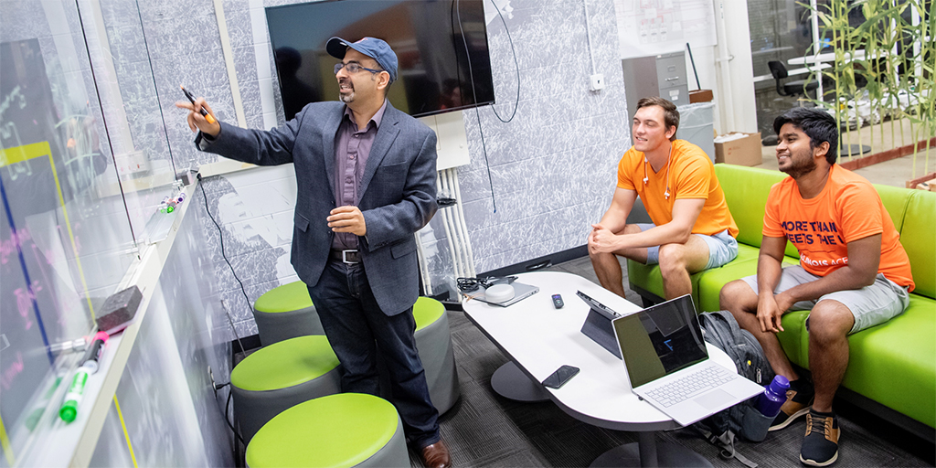 Chowdhary and his students (Photo credit: Matthew Lester Photography, LLC. and Illinois News Burea)