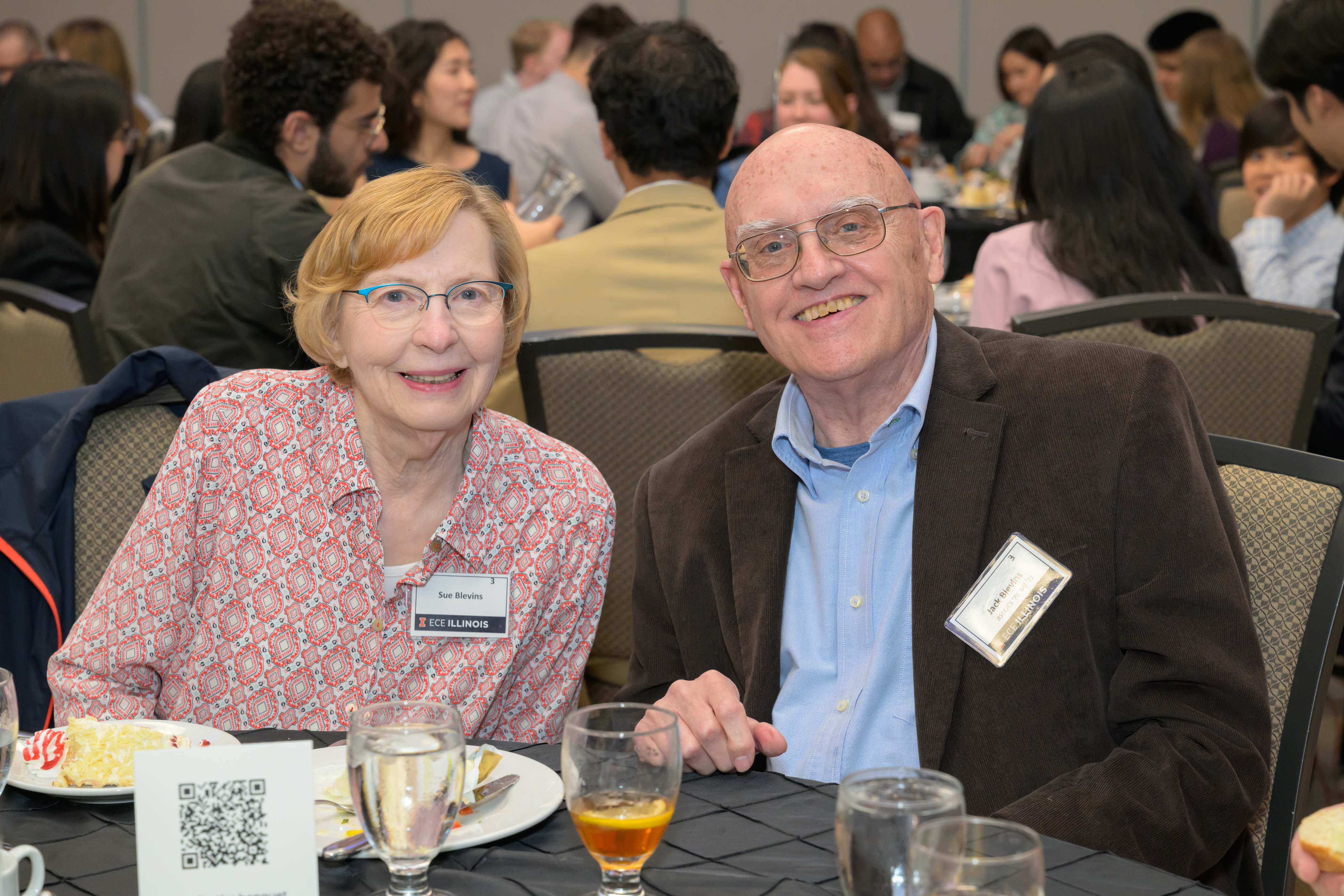 Sue and Jack Blevins sitting at a table smiling