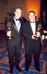 Bitzer and Willson with their Emmy Award