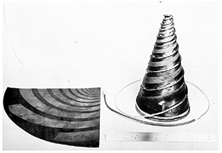 Four-arm conical log-spiral antenna constructed from coaxial cable.
