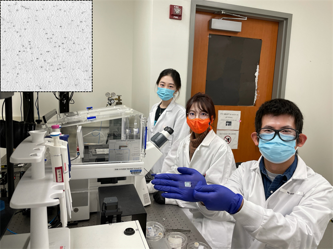 The HMNTL team displays new COVID-19 antibody test. At the top left corner is a PRAM image in which each black dot represents one detected COVID-19 antibody molecule.