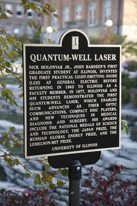 A plaque commemorating ECE Professor Nick Holonyak’s invention of the quantum-well laser now stands in the footprint of the old Electrical Engineering Research Laboratory.