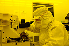 A person conducts research in an HMNTL cleanroom.