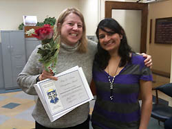 ECE Lecturer and chief undergraduate advisor Marie-Christine Brunet (left) was presented the Amy L. Devine Award by Sonam Patel of Alpha Omega Epsilon engineering sorority.