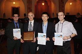 ECE graduate students Josh Wood, Kevin He, and Justin Koepke were honored at the IEEE Nano 2012 Conference. They are pictured with their advisor Professor Joe Lyding (second from left).