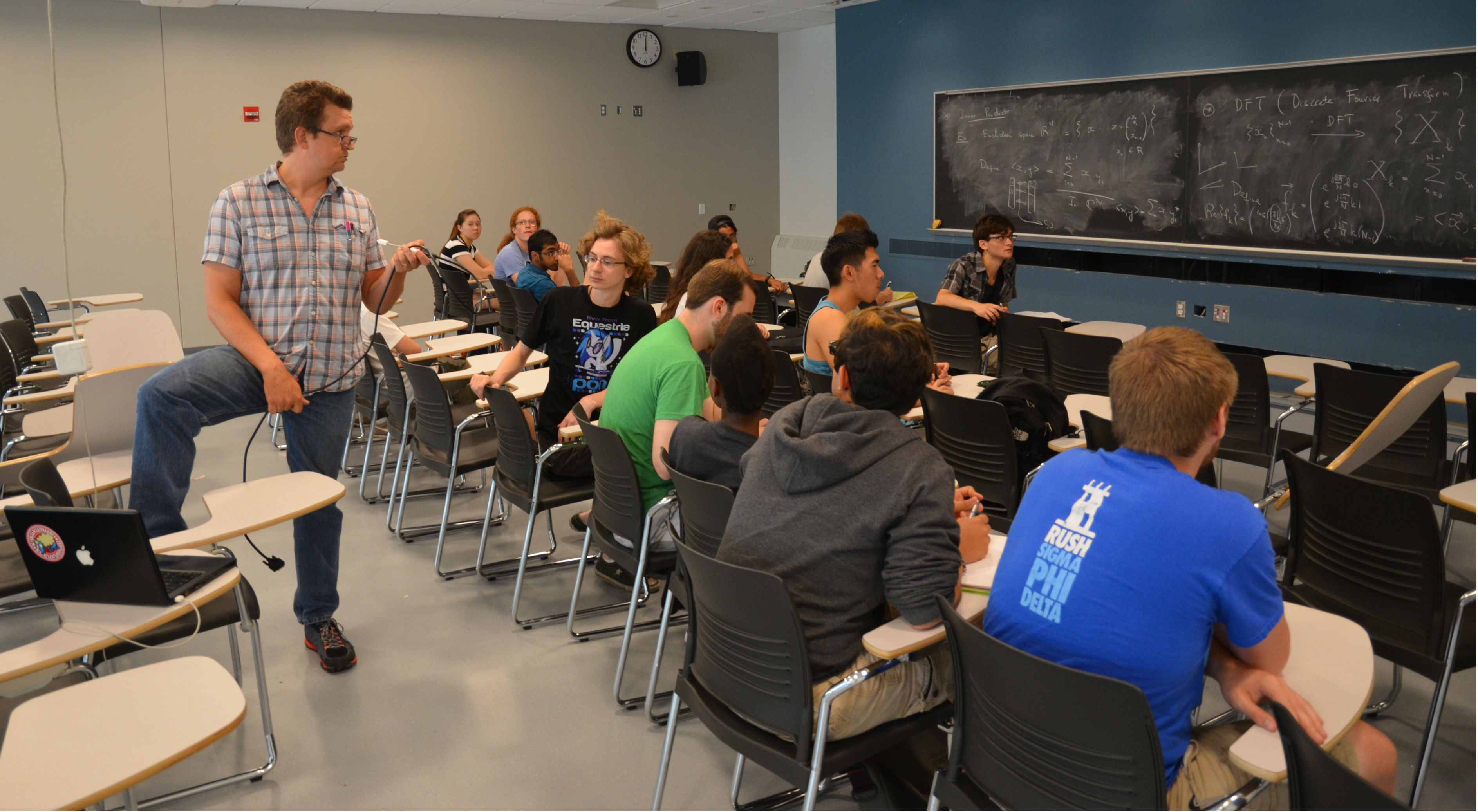 ECE Professor Scott Carney lectures the new ECE 398 class on the methods of the engineering process.