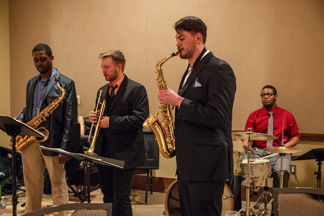 A jazz band plays at the PECI social event. 