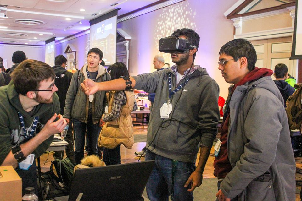 Trying out an Oculus Rift, photo by Achal Varma. 