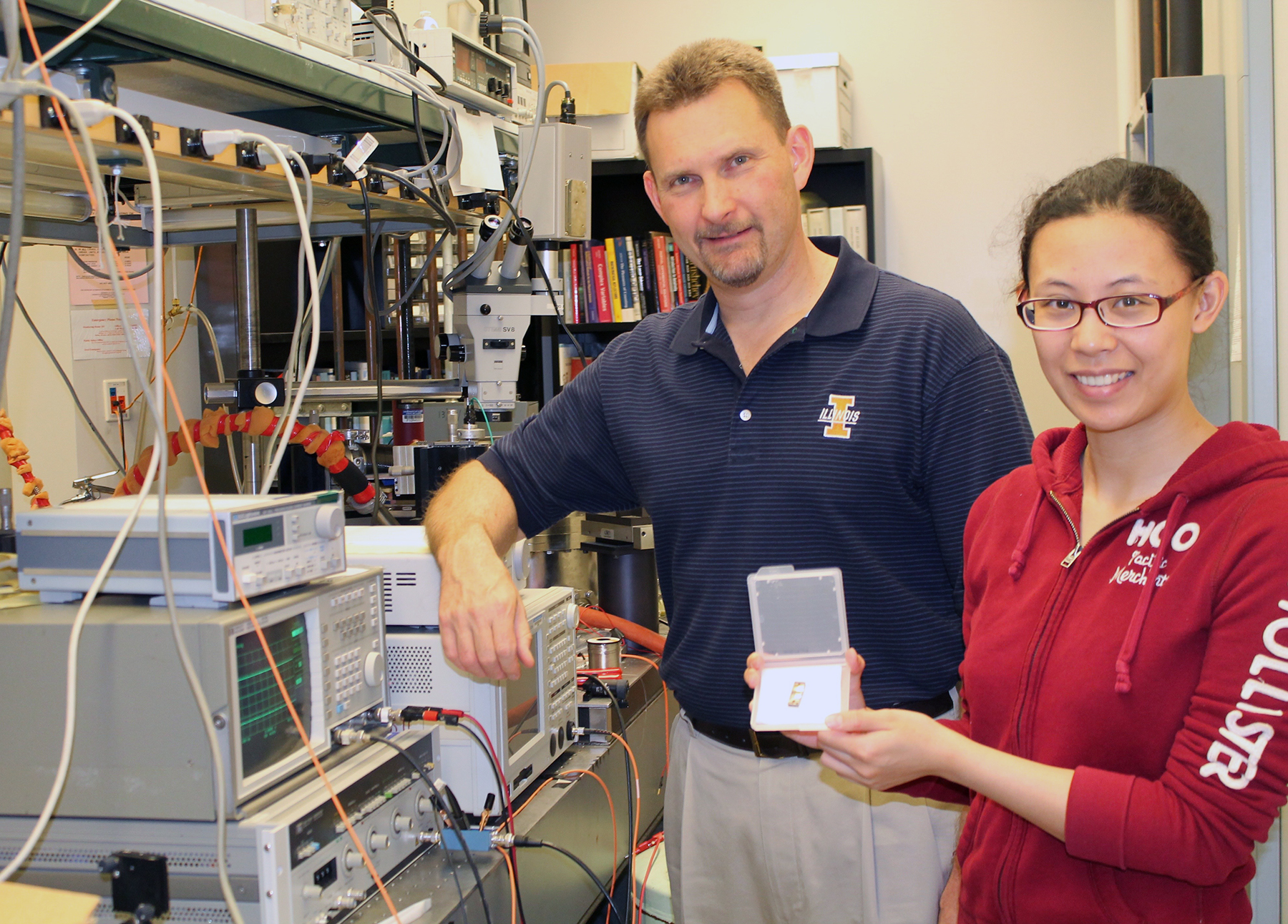 Associate professor John Dallesasse (left) and his graduate student Kanuo Chen (right)