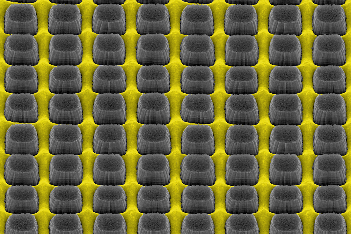 An array of nanopillars etched by thin layer of grate-patterned metal creates a nonreflective yet conductive surface that could improve electronic device performance.