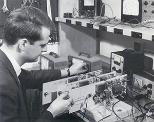 James Beauchamp sits at a workbench tuning three circuit boards before installing them in the Harmonic Tone Generator. This picture was taken in 1964. Courtesy of James Beauchamp 