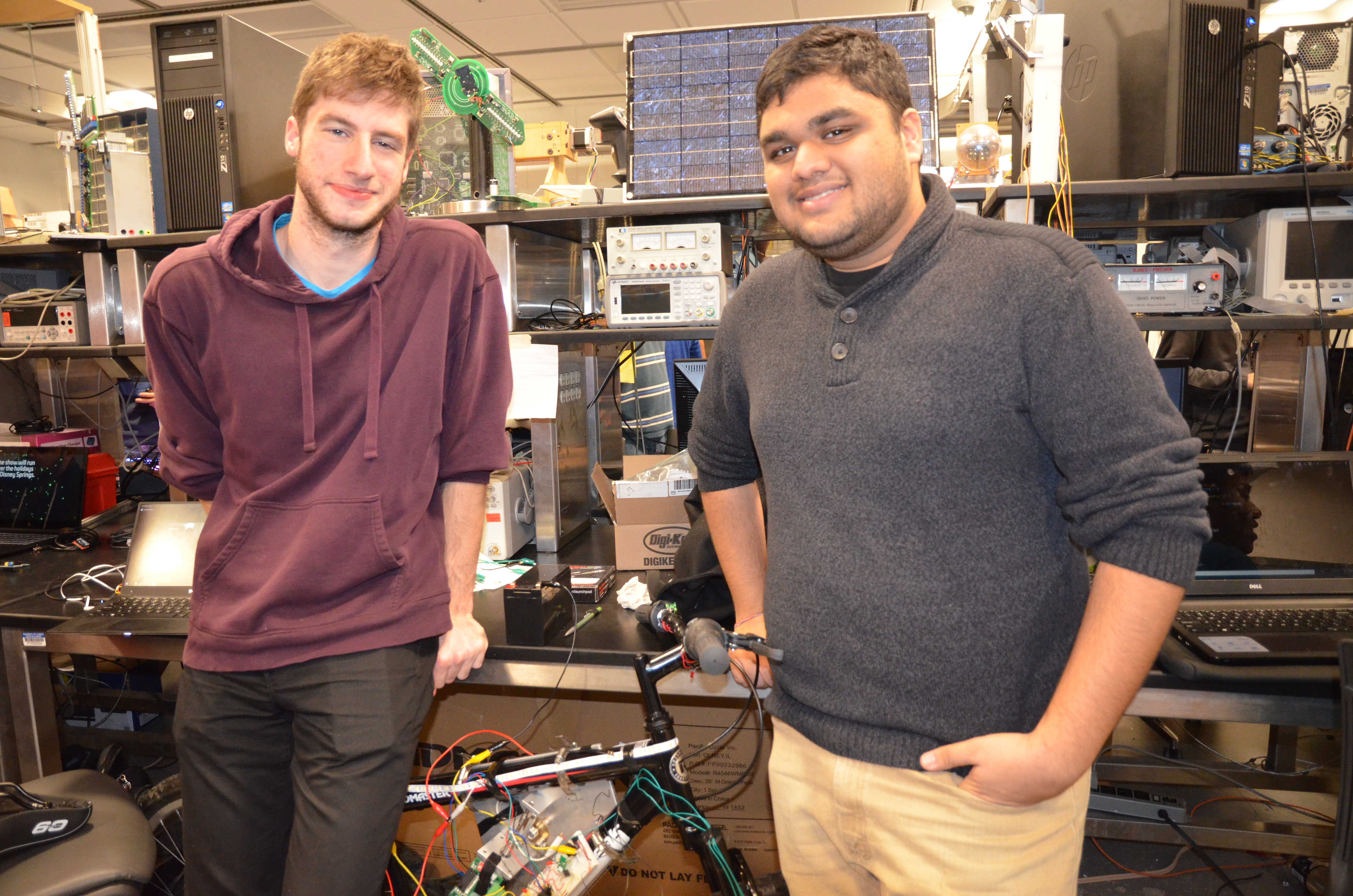 Sahil Kumar and Sam Walder showing off their automatic gear shifter.