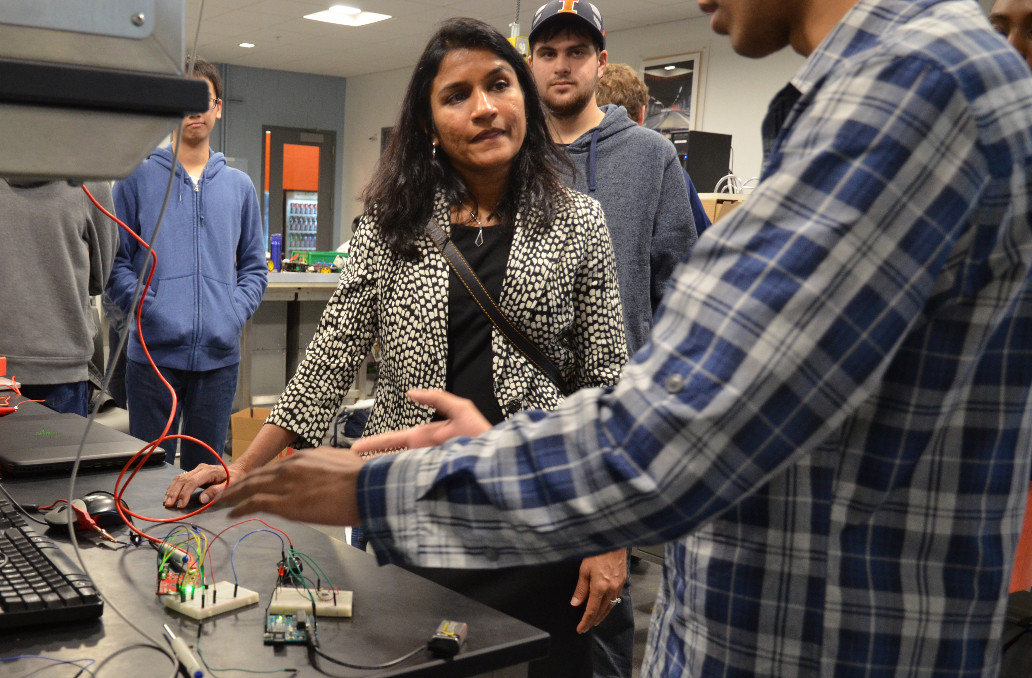 Krunali Patel, vice president and general manager of Texas Instruments, visited the TI Electronics Design Lab earlier this year. Students demonstrated how they are using TI technology to power their projects.