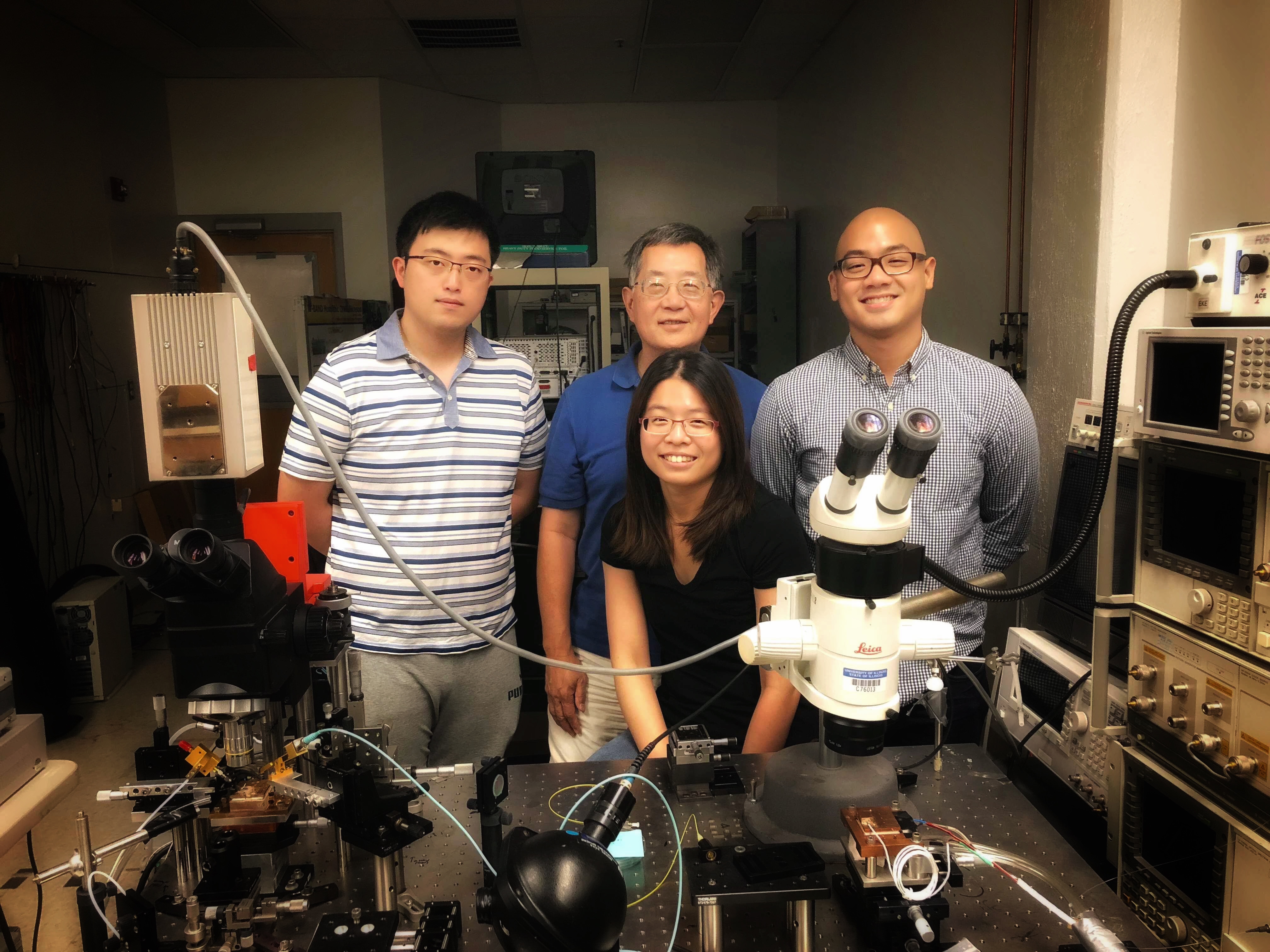 Junyi Qiu, Endowed Chair Emeritus Milton Feng, Ardy Winoto (from left to right), and Yu-Ting Peng (front). 