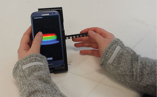 The TRI Analyzer, inspired by the Star Trek 'tricorder,' detects color changes in biological assays. Courtesy of Kenneth Long and Photonics Media.