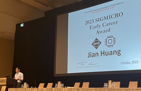 Jian Huang accepts the ACM SIGMICRO Early Career Award at the 56th IEEE/ACM International Symposium on Microarchitecture
